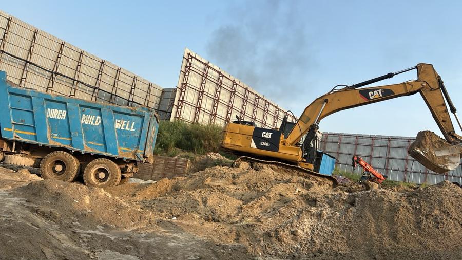 Durga Buildwell tipper and excavator, Noida