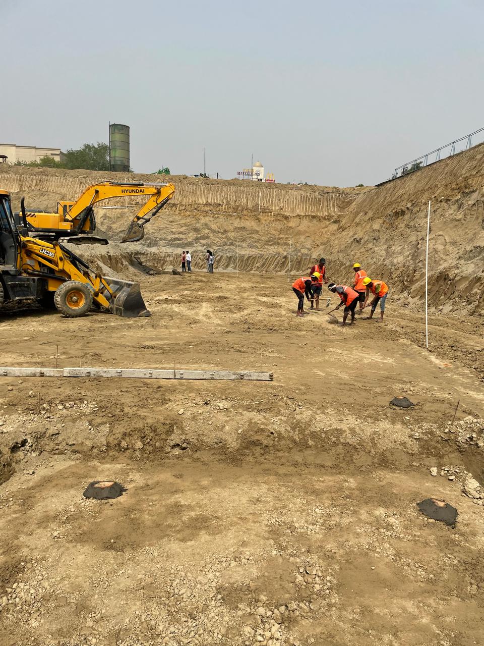 Excavation with safety barricading